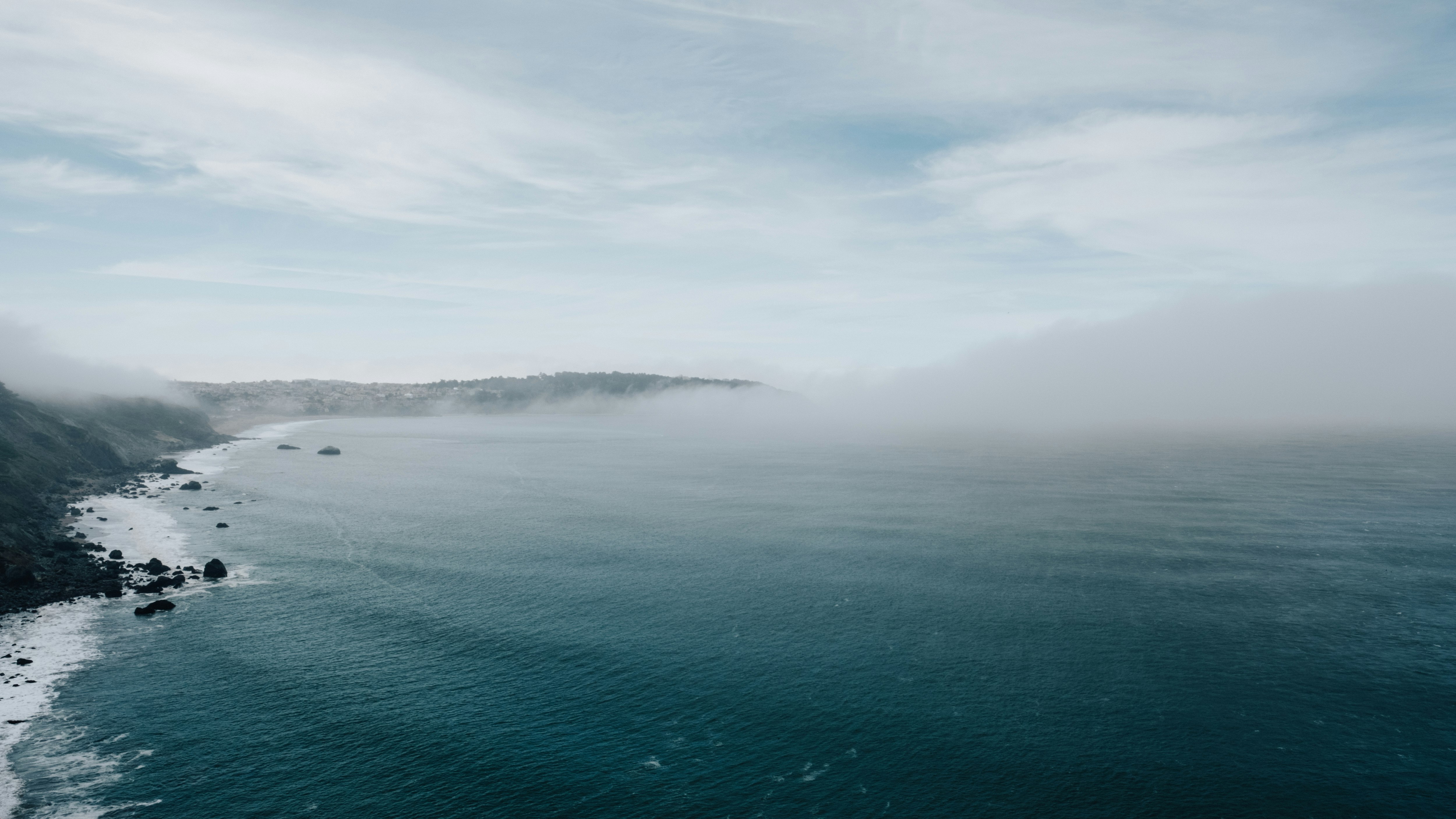 calm body of water during daytime